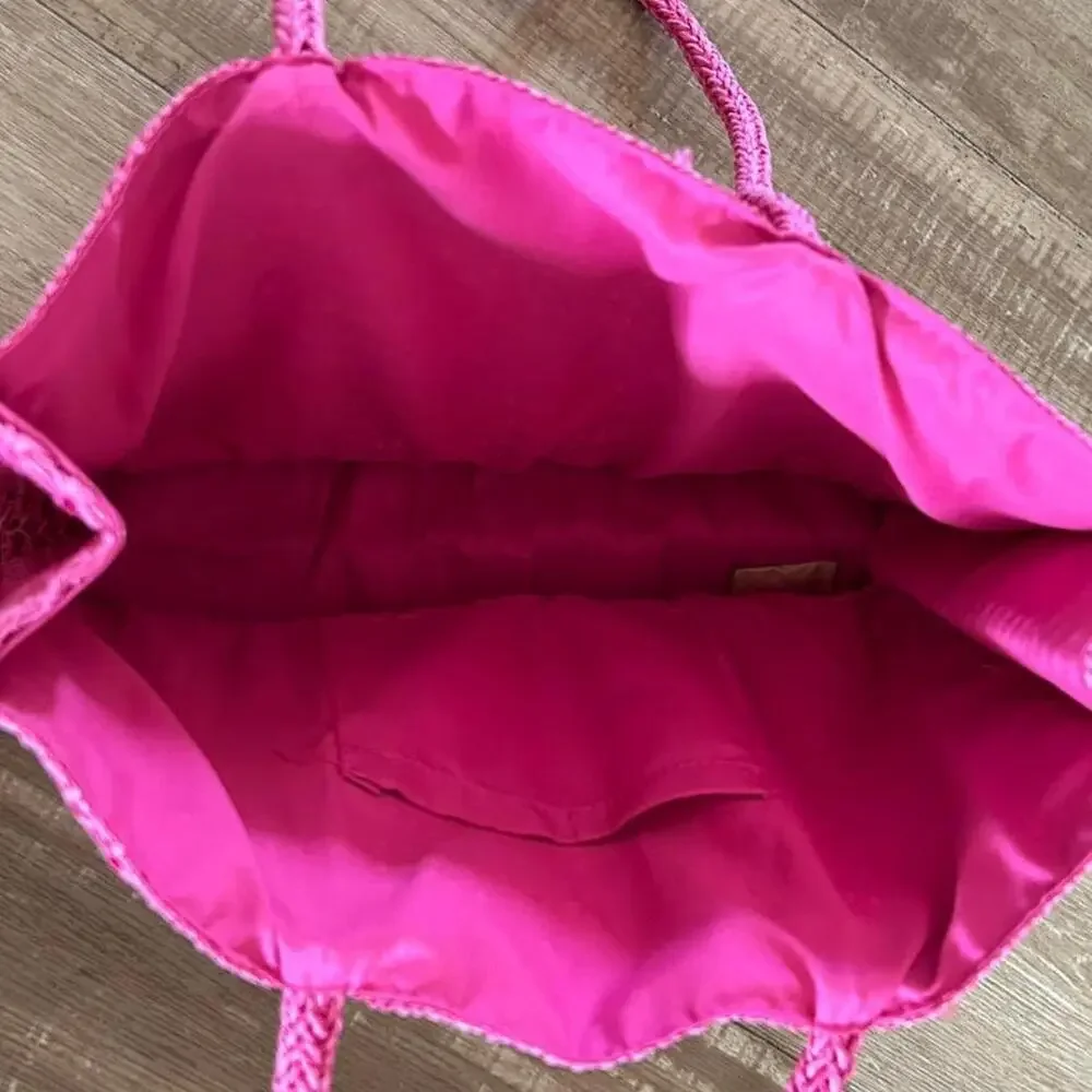 Pink Juicy Couture woven tote bag with braided handles